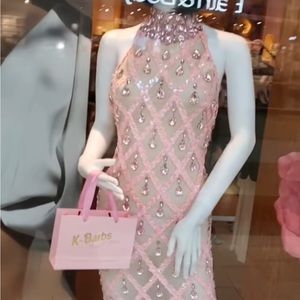 A beautiful crystal pink dress from K-Barbs Boutique